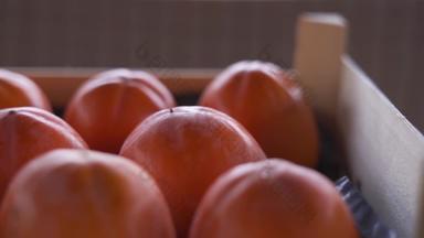 成熟的美味的柿子<strong>打包盒</strong>子特写镜头
